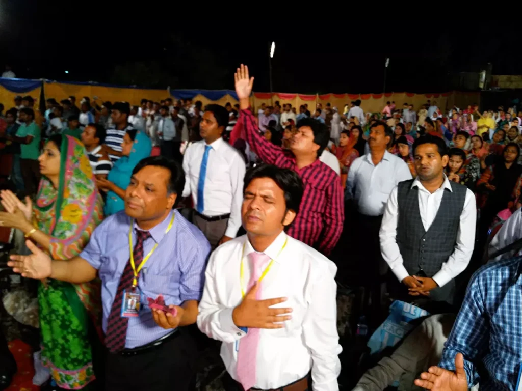 Pastors and church leaders in fellowship during conference