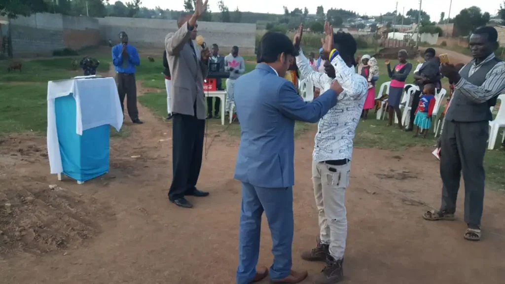 bishop Amanat is praying for healing for young boy in africa